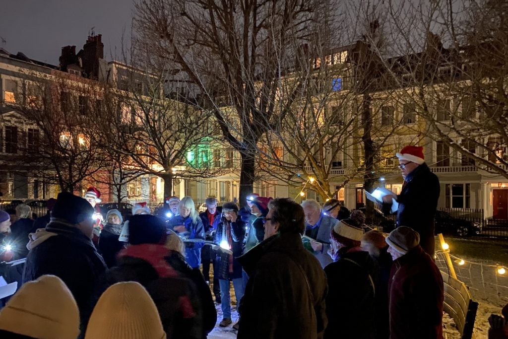 Christmas Carols in Chalcot Square, December 2022. Photo by Jason Pittock